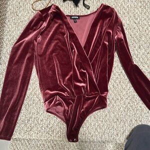 Burgundy thong bodysuit.